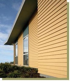 Yellow siding on a modern home.