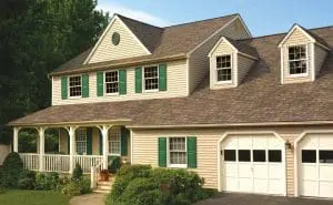 Two-story house with a brown roof.