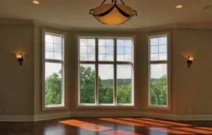 Large bay window with view of trees.